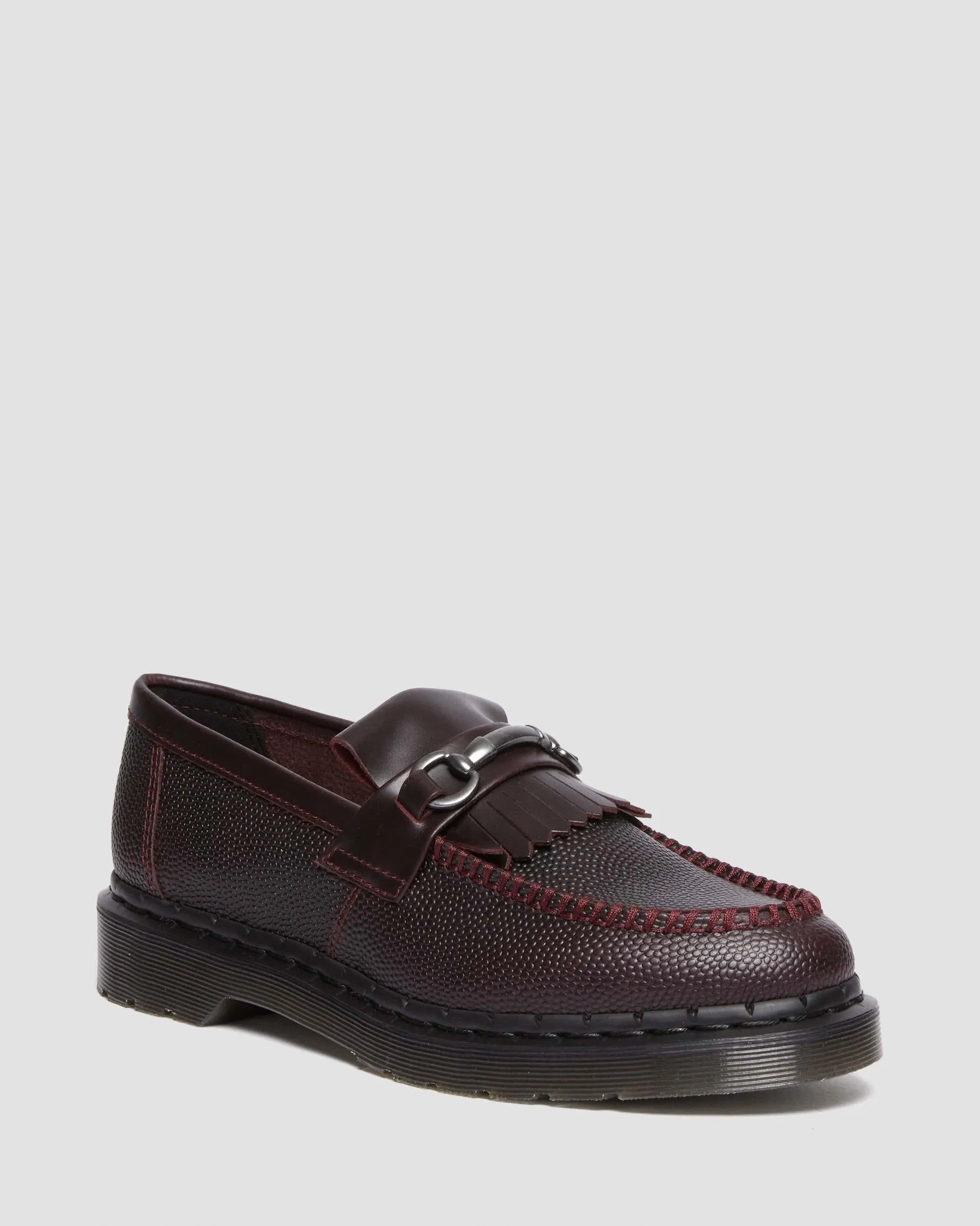 Adrian Snaffle Dr. grain leather kiltie loafers. Martens