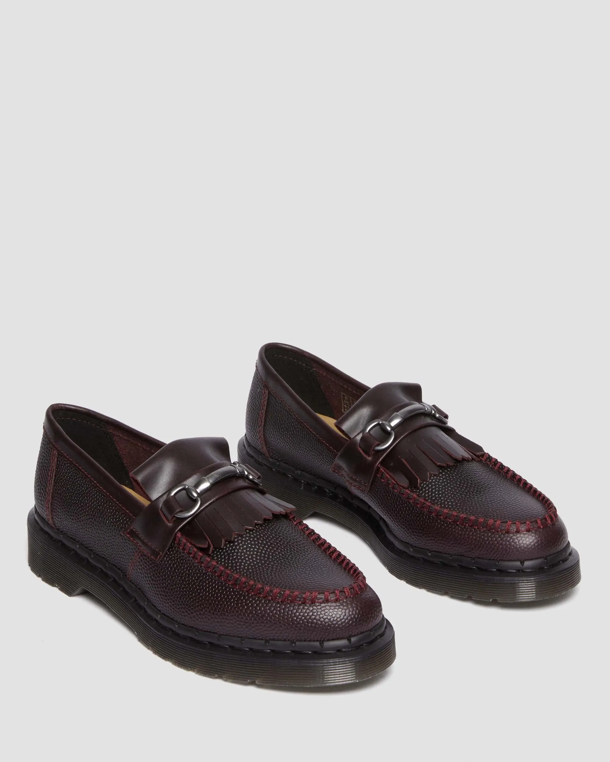 Adrian Snaffle Dr. grain leather kiltie loafers. Martens